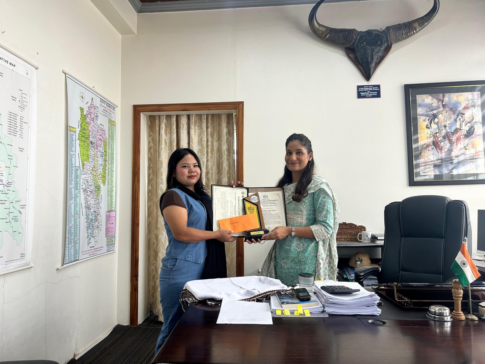 Lunglei District Collector Felicitates Best Seller Award Winner Lalniliani of Mualthuam North at a Tea Reception