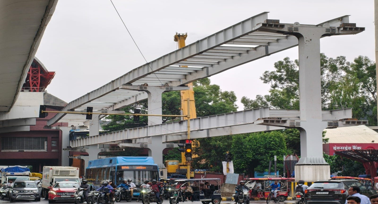 Skywalk under construction at Madhuban Chowk to strengthen safe pedestrian connectivity between metro stations and Rohini Court