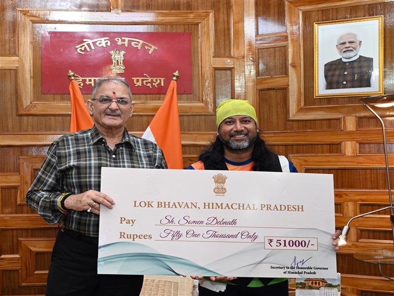 Internationally acclaimed world cyclist Somen Debnath calls on Governor