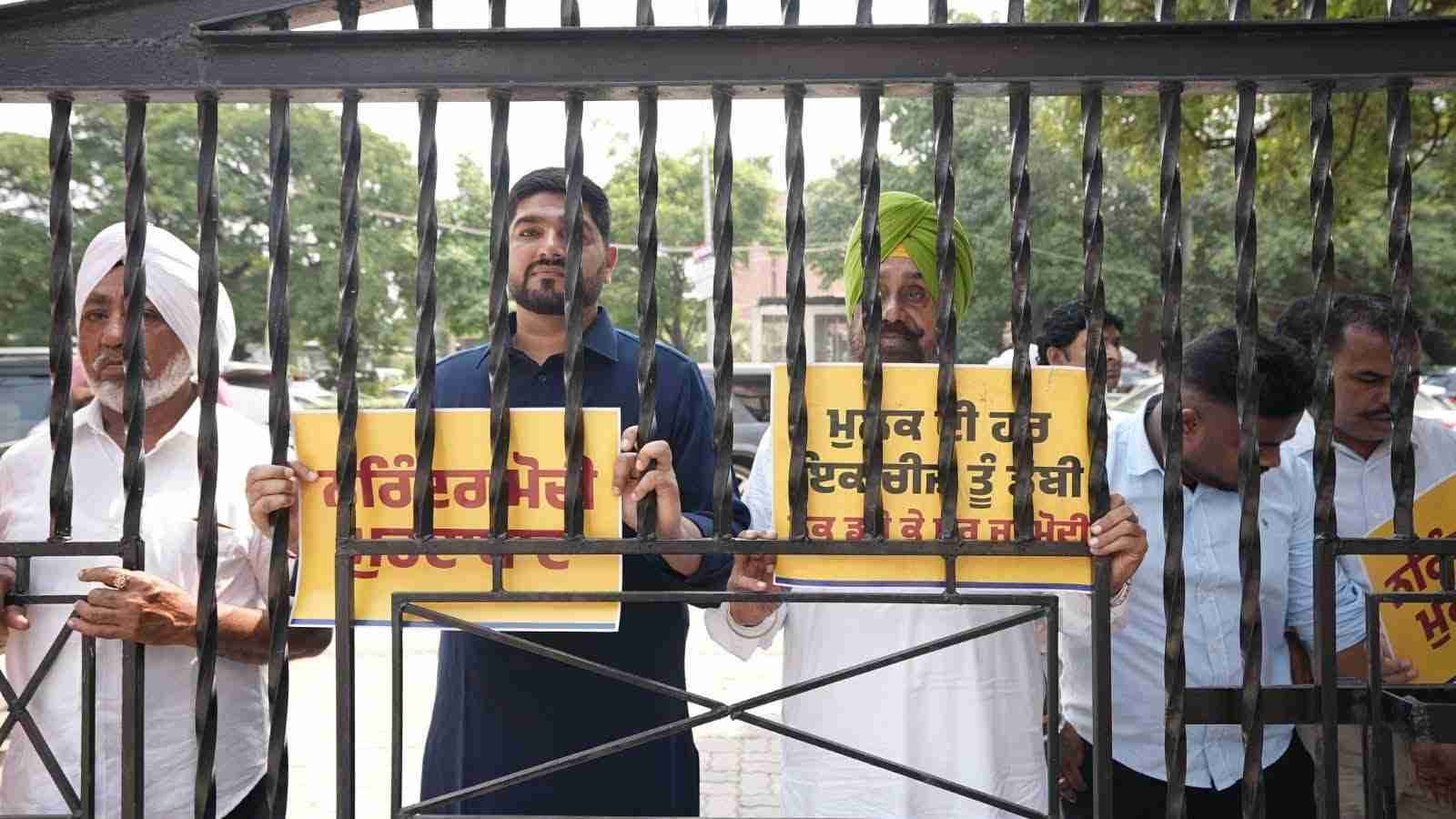 AAP Leaders and Workers Protest Against ED Raids Ahead of Electionsest Against ED Raids Ahead of Elections