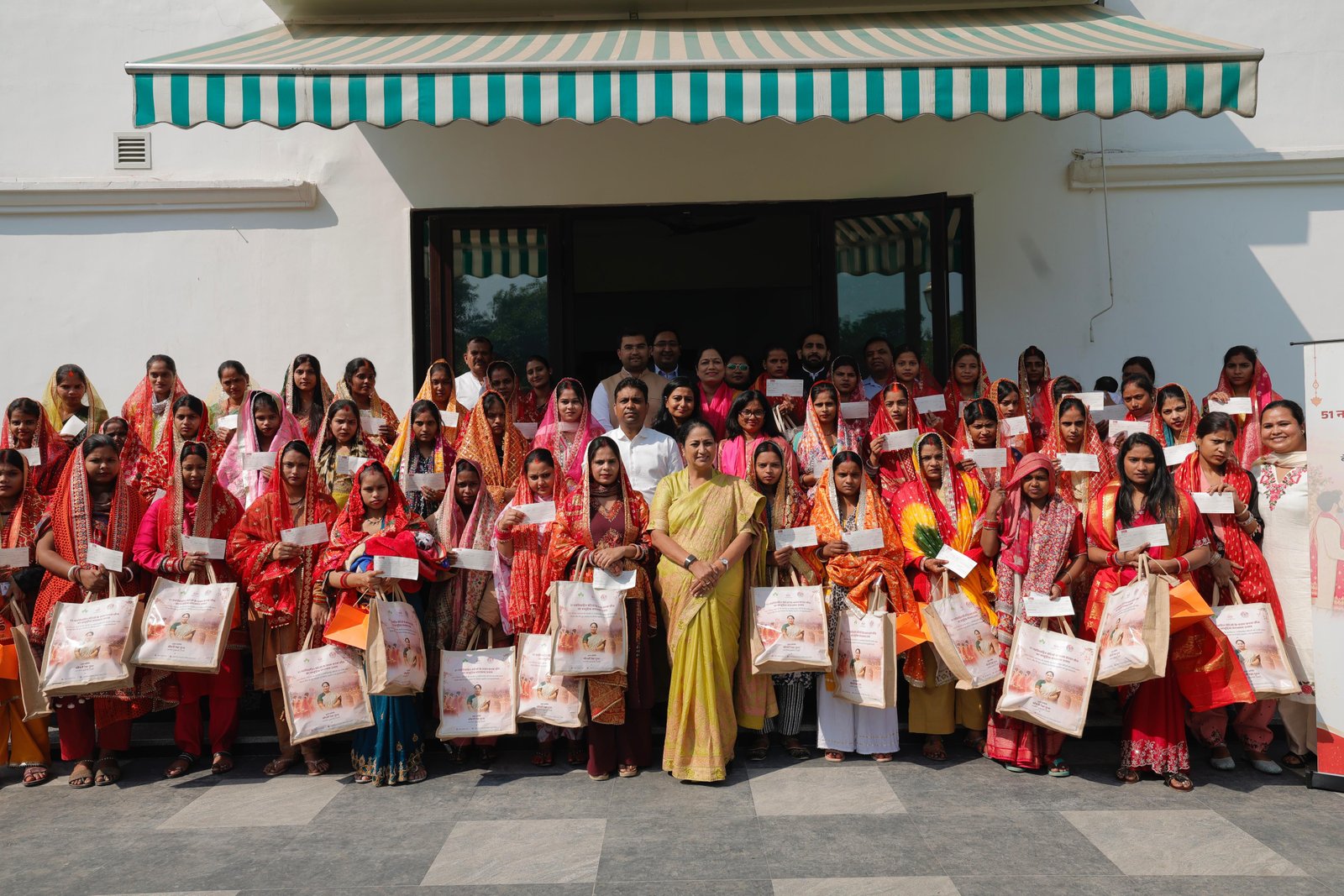CM Rekha Gupta Hands Over Cheques of ₹1 Lakh Each and Karwa Chauth Kits to 51 Newlywed Women